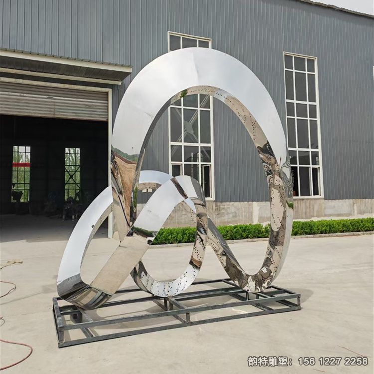 大型不銹鋼飄帶雕塑，紅色發光絲帶雕塑圖片